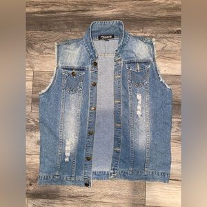 a jean vest with a sunflower painting